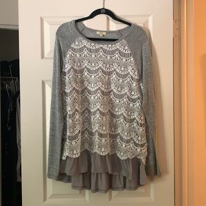 Peplum-style long sleeve blouse